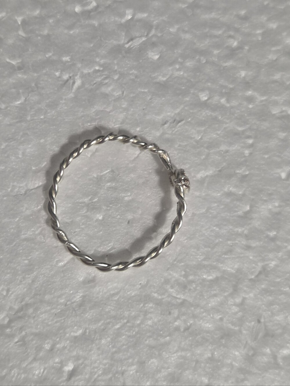 Handcrafted Delicate Twisted Silver Ring with Knot Accent